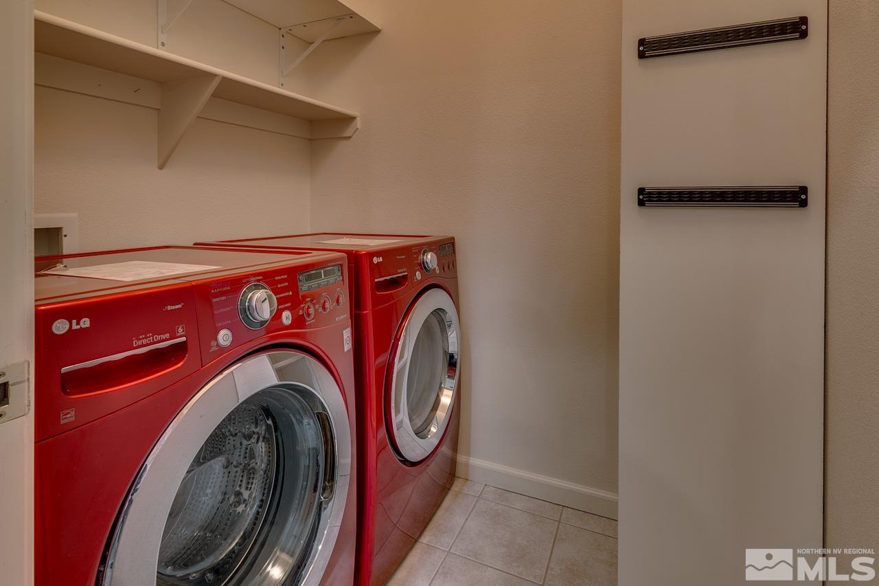 900 S Meadows, Unit 2623 Reno, NV 89521 - Photo 7 of 28 a utility room with dryer and washer