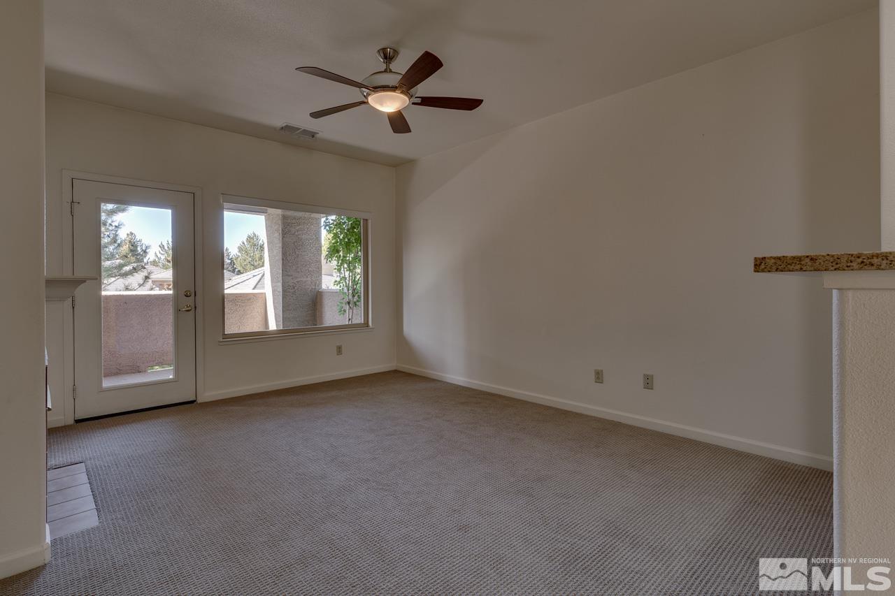 900 S Meadows, Unit 2623 Reno, NV 89521 - Photo 10 of 28 an empty room with windows