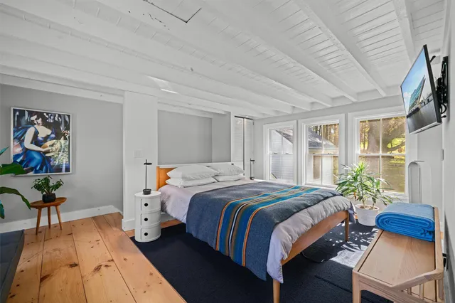 a bed room with a bed and a couch