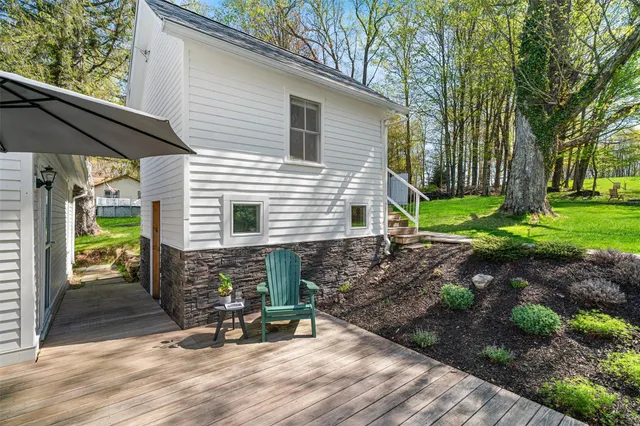 a bed room with a bed and a window