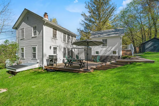 a front view of house with garden