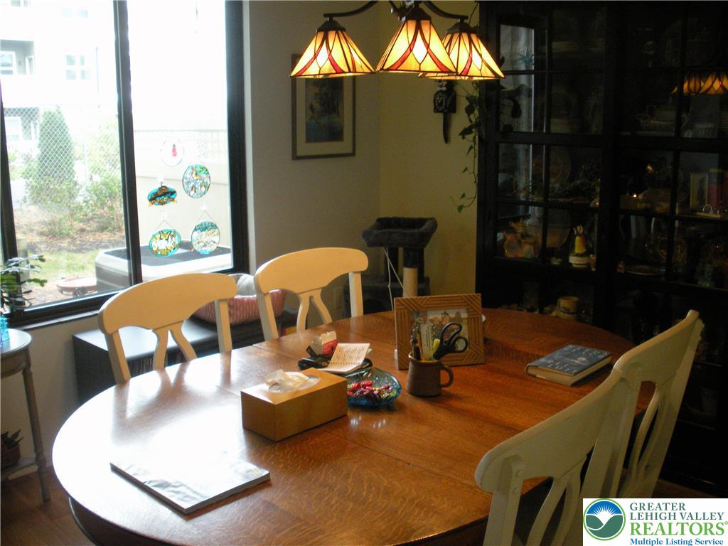 1201 Butztown Road, Unit 1 Bethlehem, PA 18017 - Photo 12 of 39 a view of a dining room with furniture and window