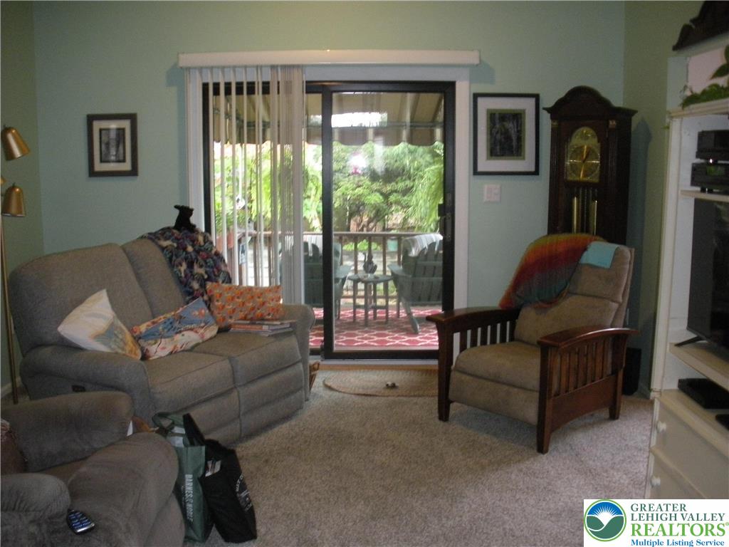 1201 Butztown Road, Unit 1 Bethlehem, PA 18017 - Photo 14 of 39 a living room with furniture and a window