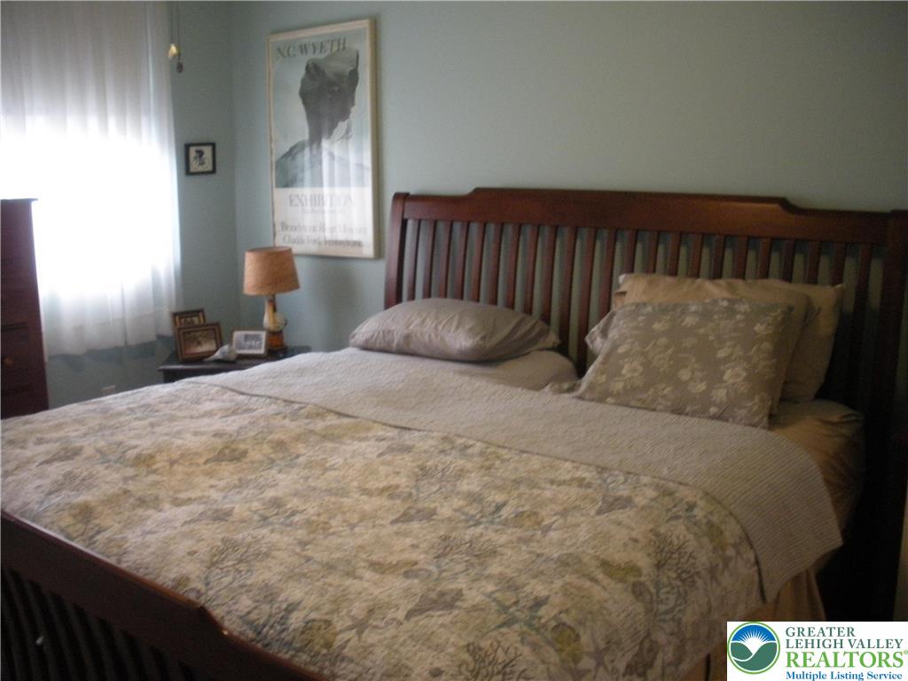 1201 Butztown Road, Unit 1 Bethlehem, PA 18017 - Photo 24 of 39 a bedroom with a bed and window