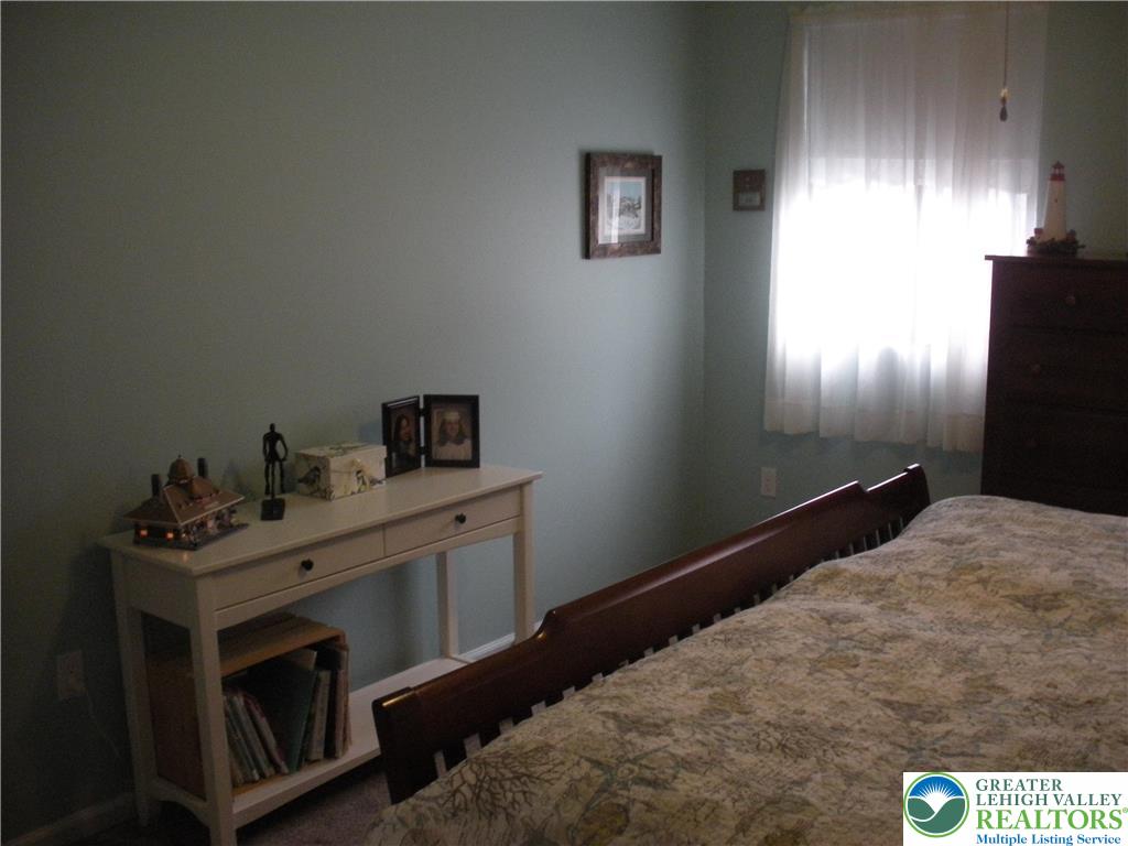 1201 Butztown Road, Unit 1 Bethlehem, PA 18017 - Photo 25 of 39 a bedroom with a bed and a window