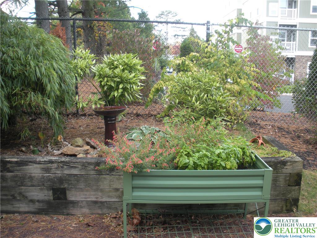 1201 Butztown Road, Unit 1 Bethlehem, PA 18017 - Photo 33 of 39 a green field with trees in the background