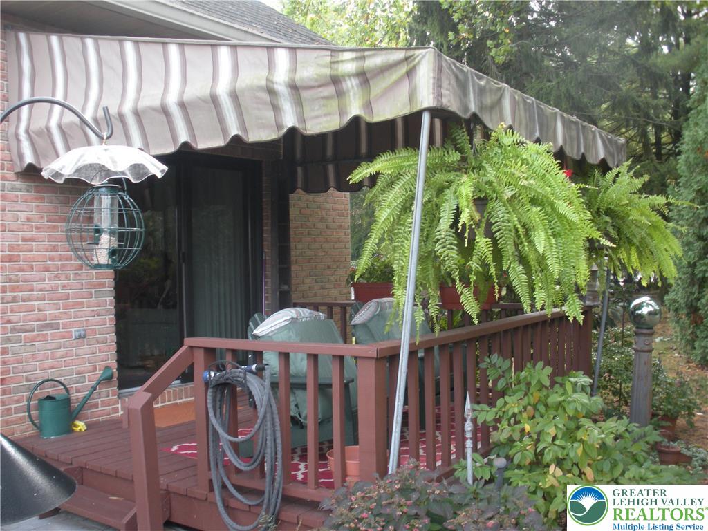 1201 Butztown Road, Unit 1 Bethlehem, PA 18017 - Photo 36 of 39 a view of a chairs and table in the backyard