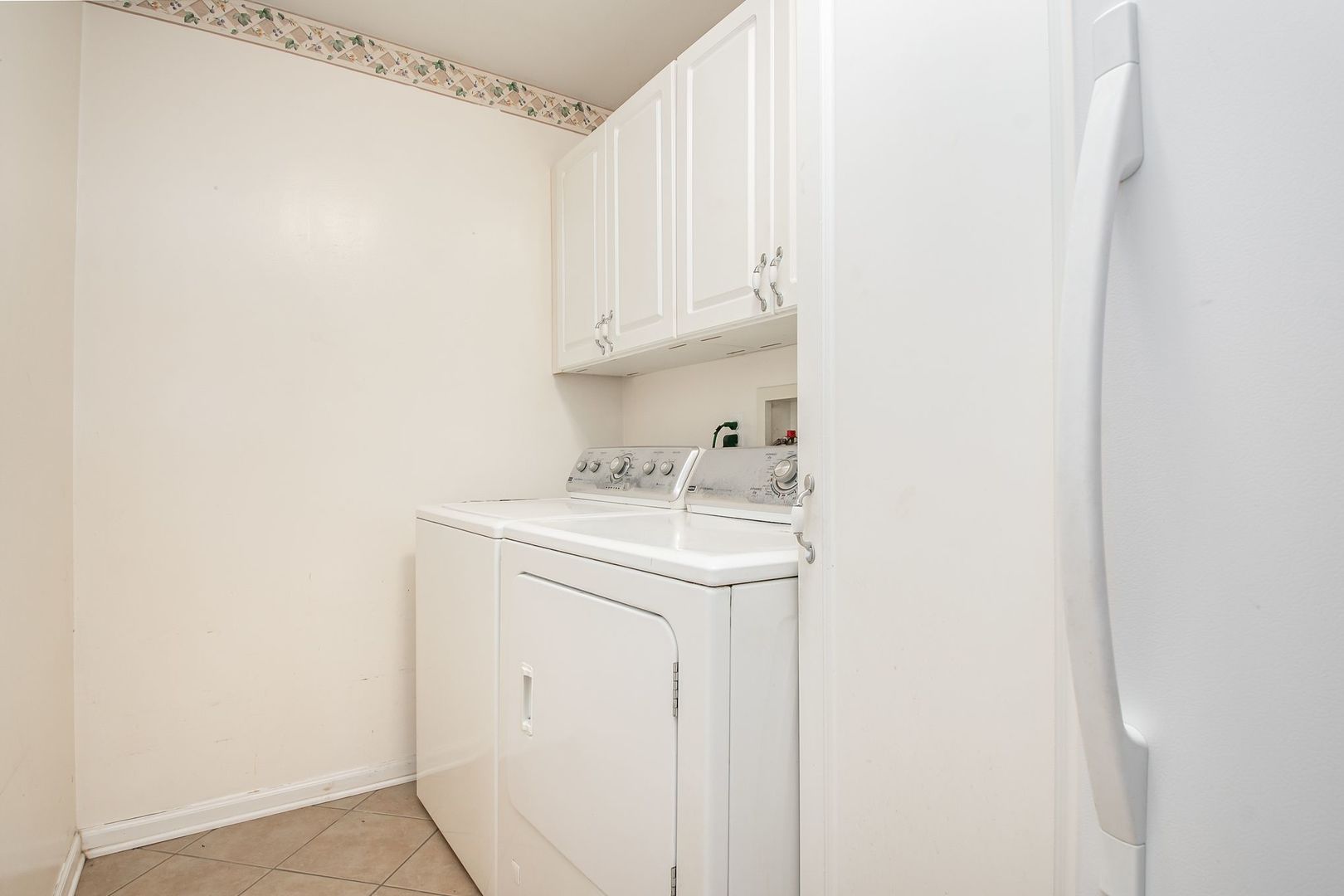 1925 Tilson Lane Romeoville, IL 60446 - Photo 16 of 27 a utility room with dryer and washer