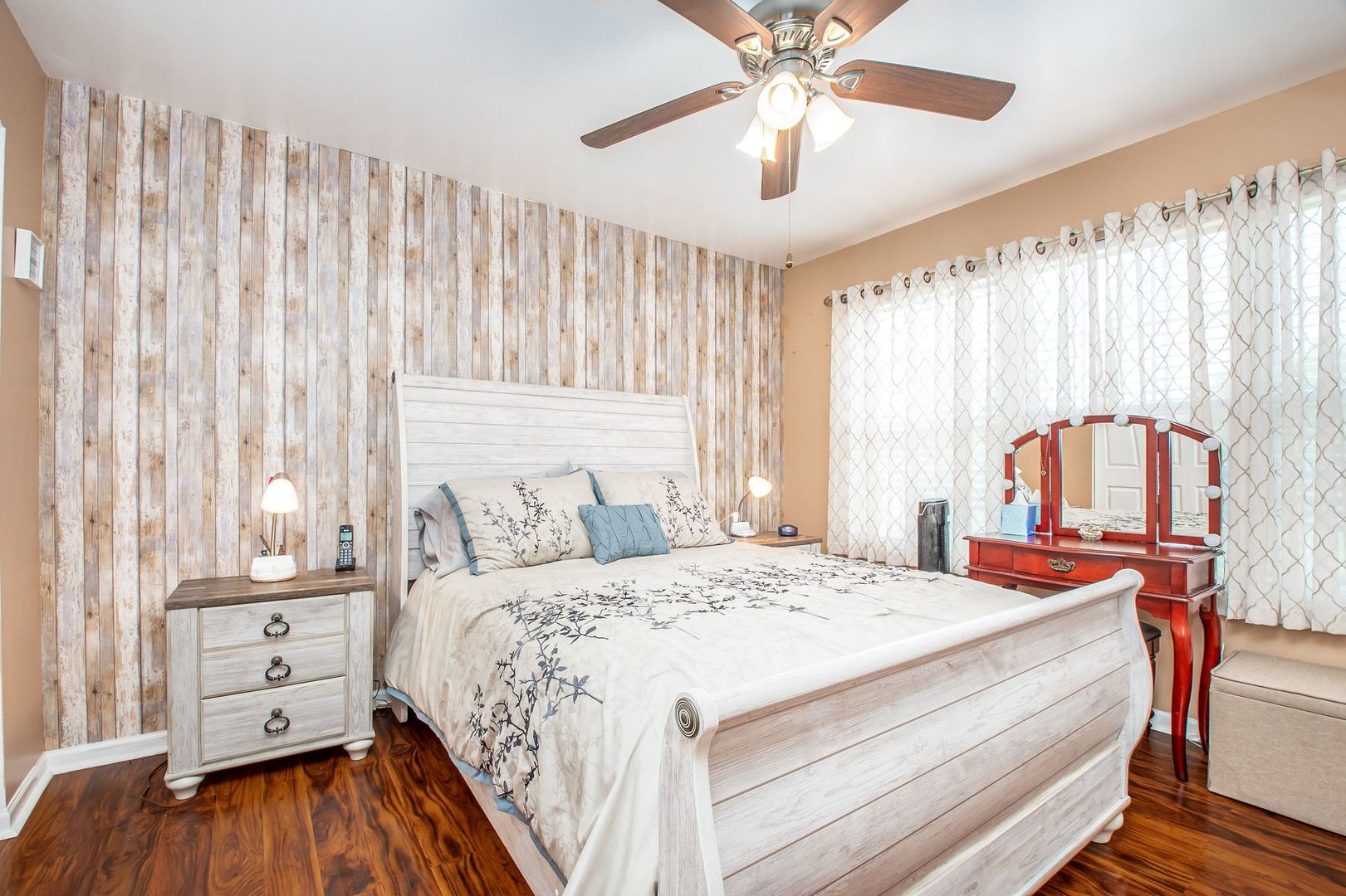 1925 Tilson Lane Romeoville, IL 60446 - Photo 22 of 27 a bedroom with a bed and a chandelier