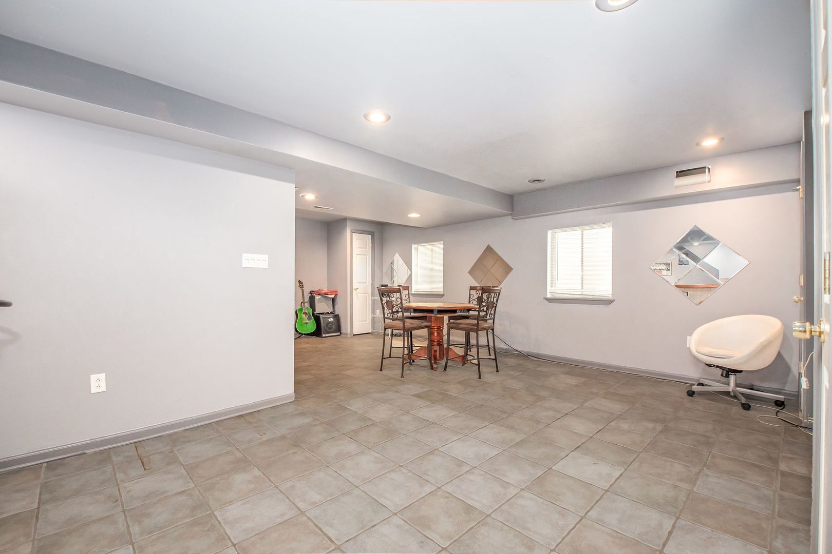 1925 Tilson Lane Romeoville, IL 60446 - Photo 25 of 27 a view of a room with chairs and a window