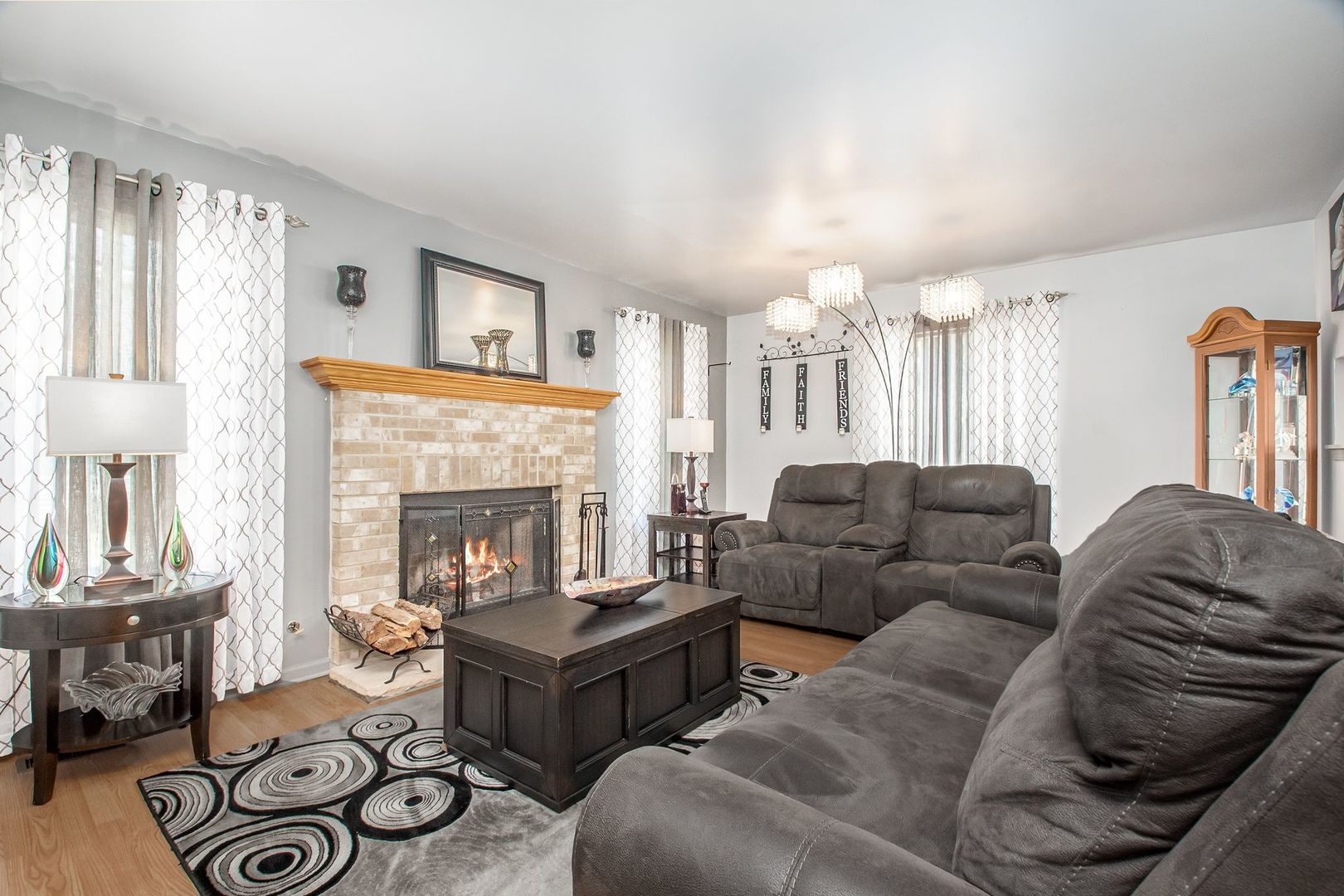 1925 Tilson Lane Romeoville, IL 60446 - Photo 9 of 27 a living room with furniture and a fireplace