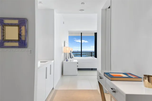 a kitchen with refrigerator and countertop