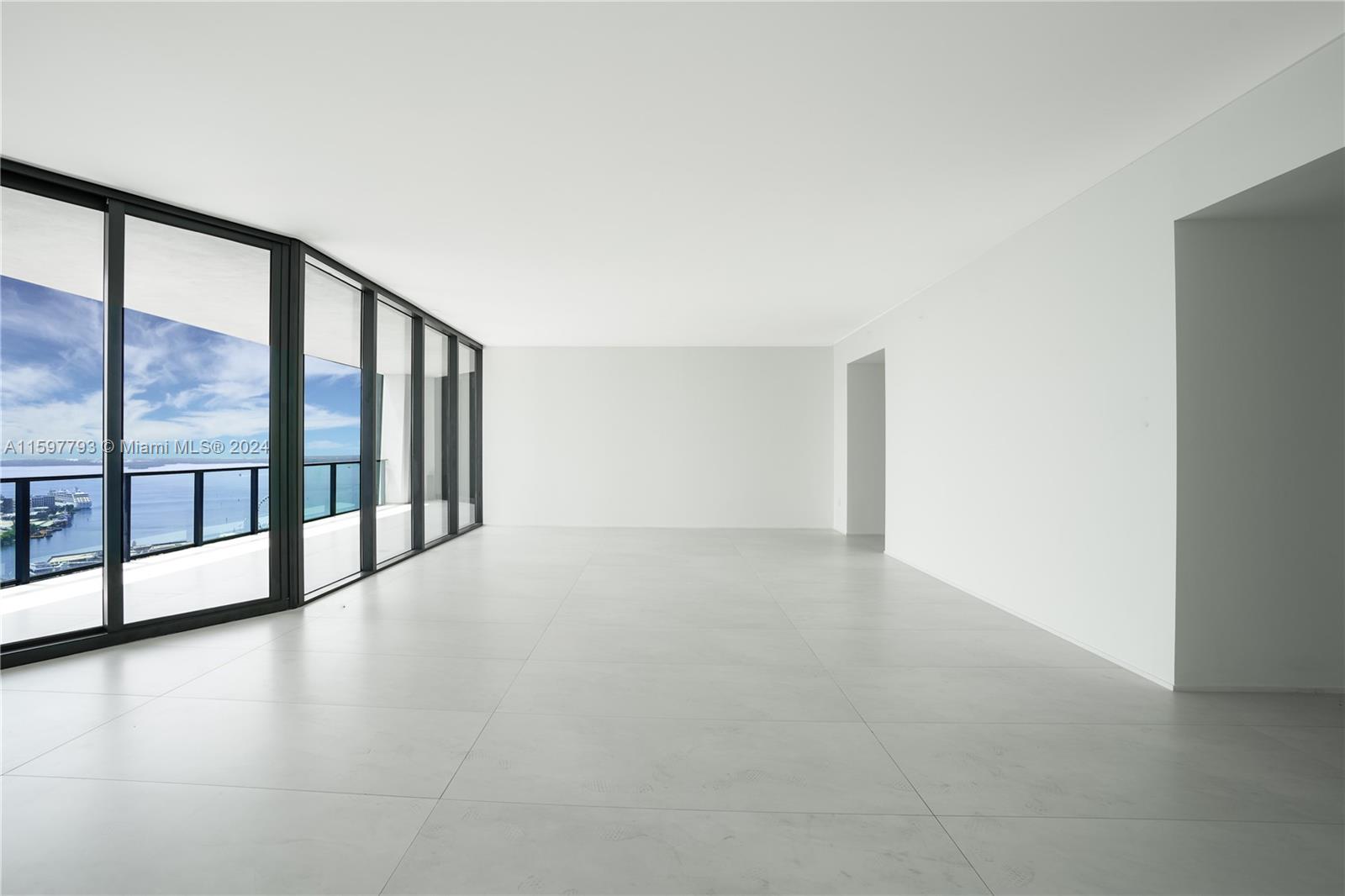 1000 Biscayne Boulevard, Unit 3701 Miami, FL 33132 - Photo 53 of 98 a view of an empty room with large windows