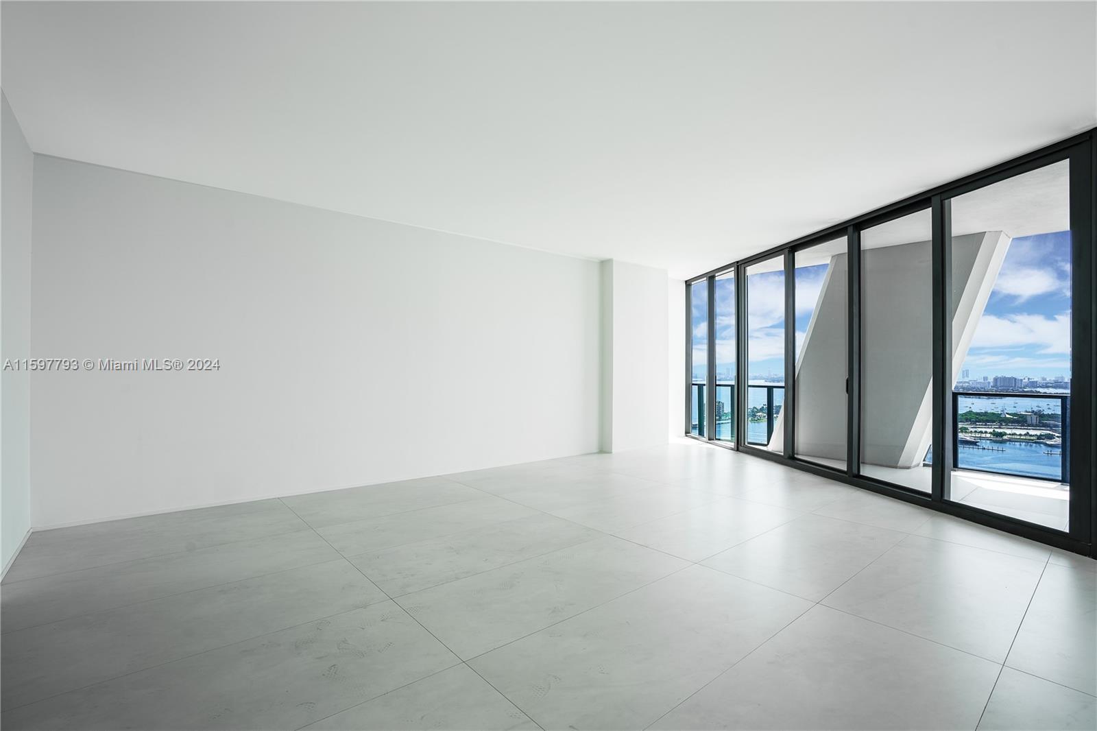1000 Biscayne Boulevard, Unit 3701 Miami, FL 33132 - Photo 54 of 98 a view of an empty room with glass door