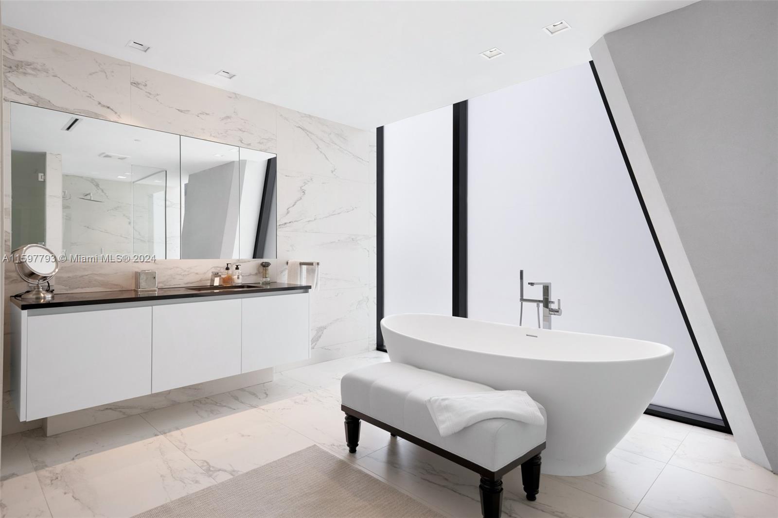 1000 Biscayne Boulevard, Unit 3701 Miami, FL 33132 - Photo 8 of 98 a living room with couch and a sink