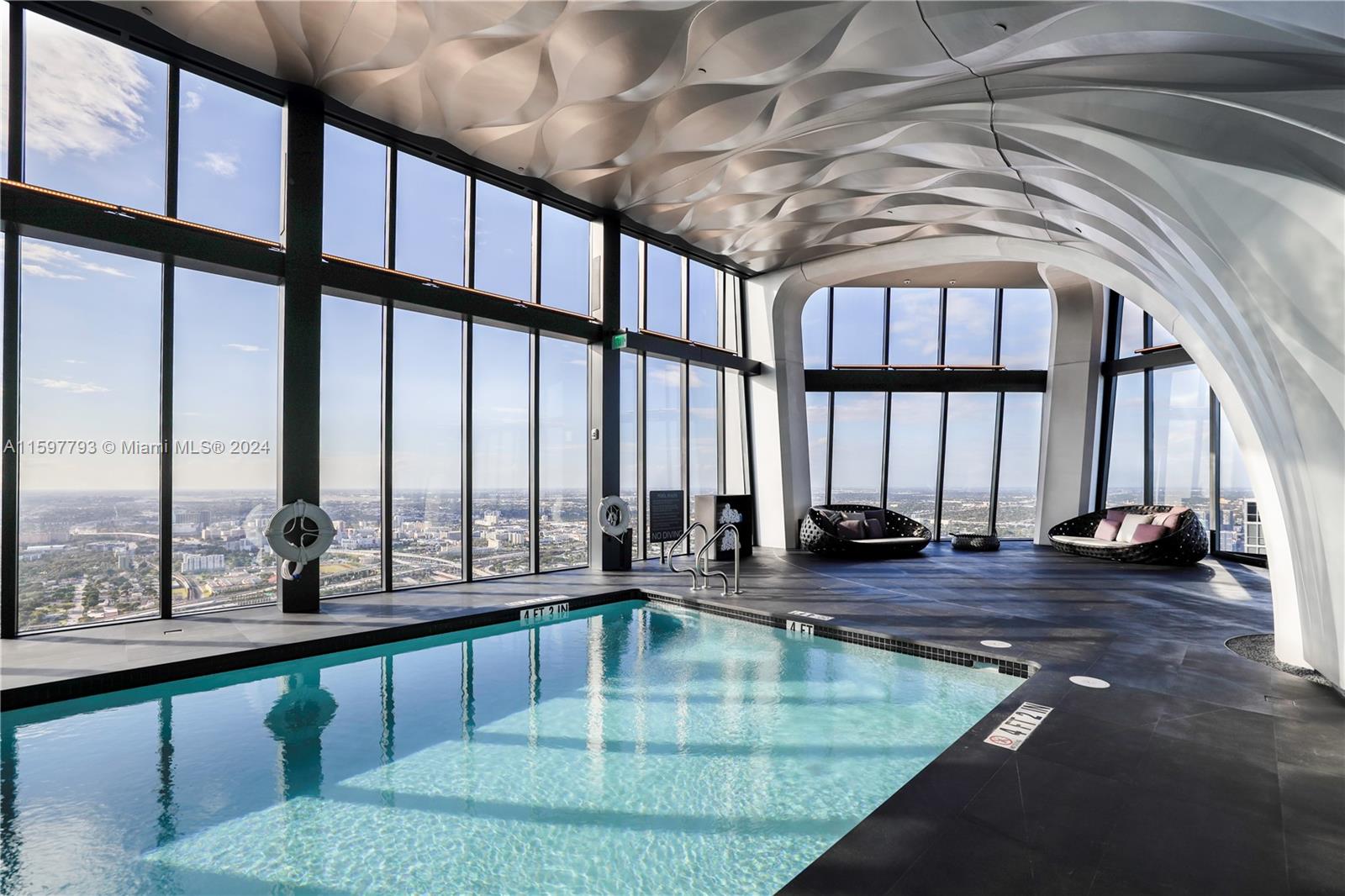 1000 Biscayne Boulevard, Unit 3701 Miami, FL 33132 - Photo 91 of 98 a view of swimming pool with seating space