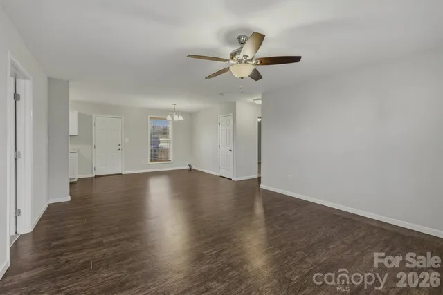 a kitchen with a sink stove and refrigerator