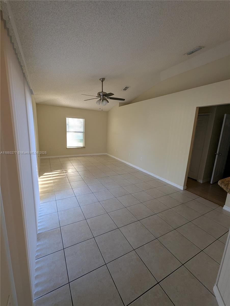 78 Pine Grove Drive Palm Coast, FL 32164 - Photo 31 of 49 a view of an empty room and a window