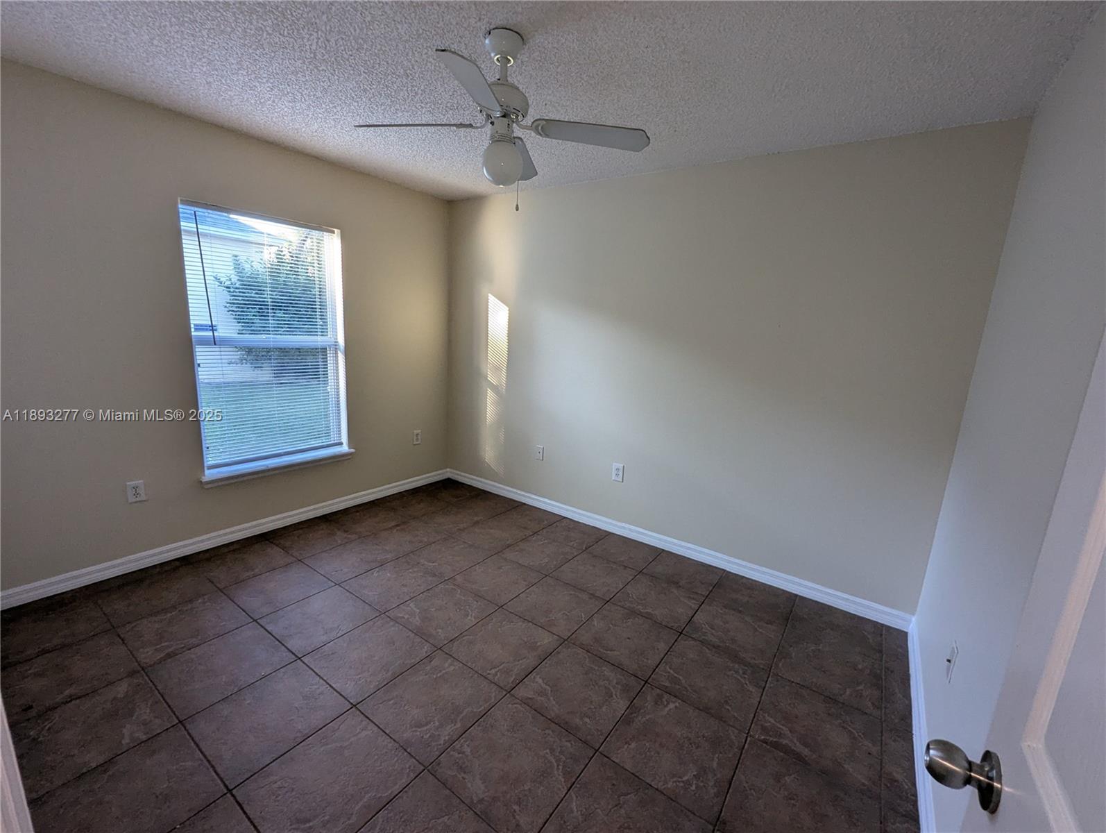 78 Pine Grove Drive Palm Coast, FL 32164 - Photo 40 of 49 a view of an empty room with a window