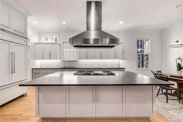 a living room with furniture fireplace and window
