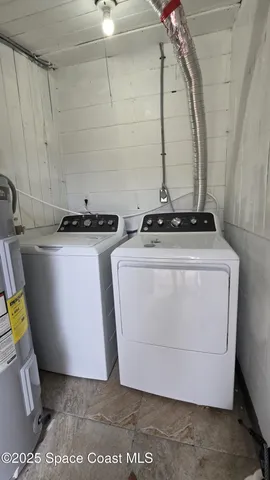a utility room with a stove