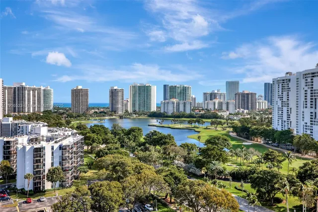 a view of a city with tall buildings