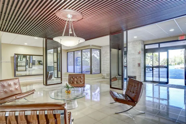 an aerial view of multiple houses with yard