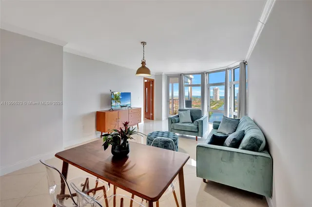 a living room with furniture and window