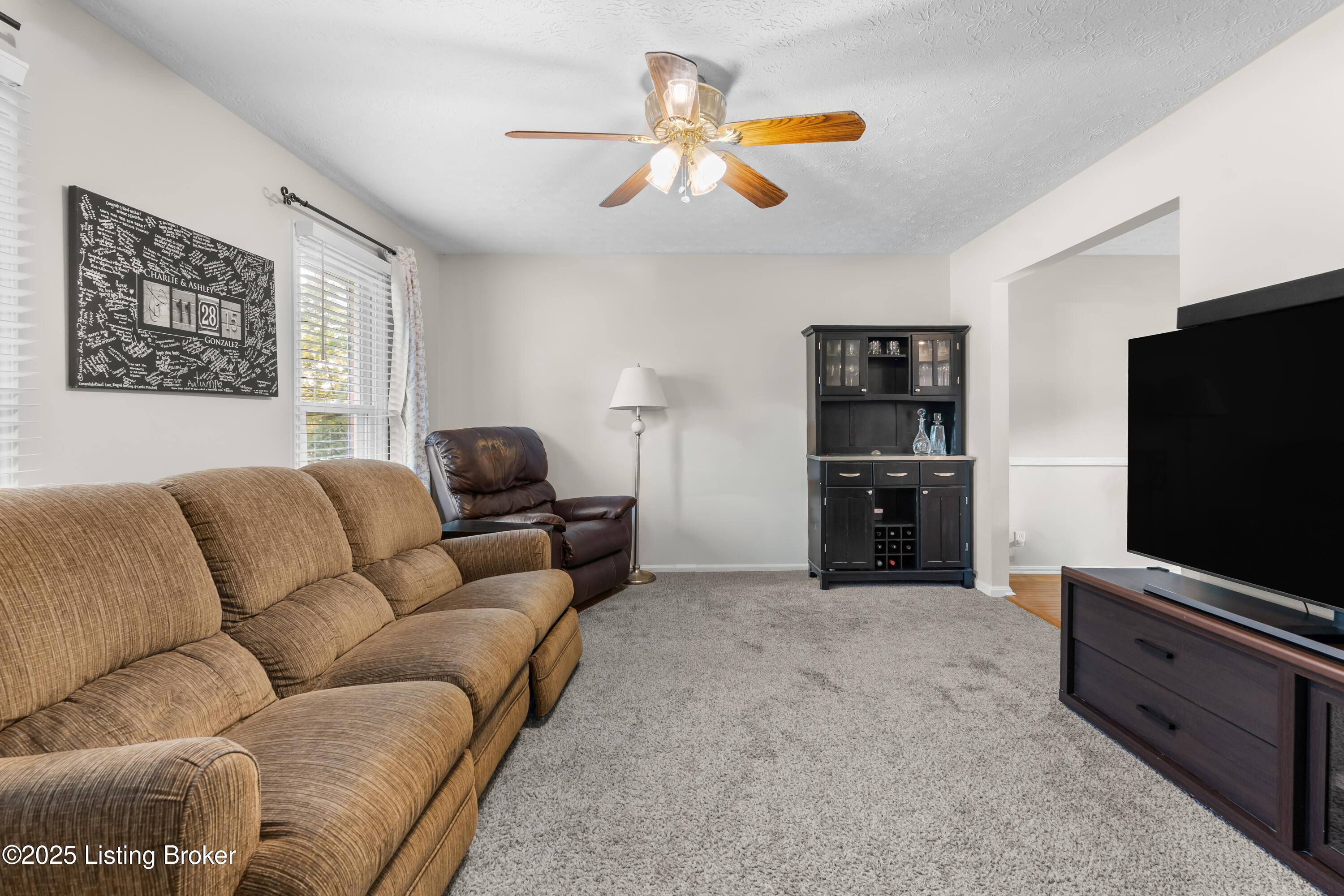 823 Creek Valley Road Louisville, KY 40243 - Photo 21 of 40 Upstairs Living area with warm natural light.