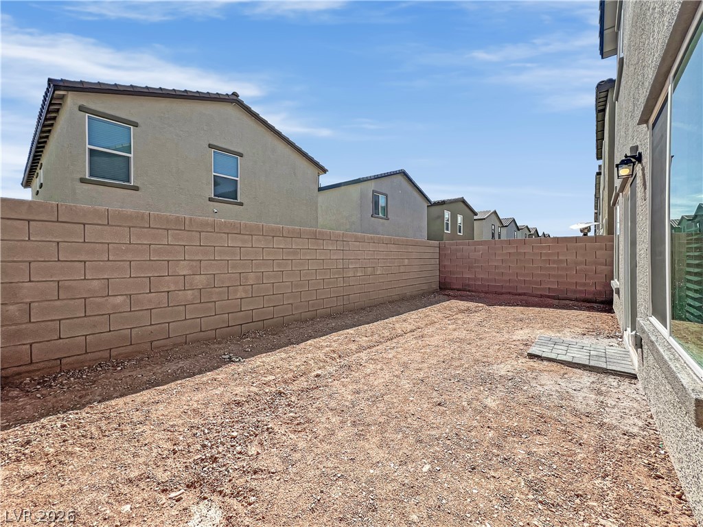 9984 Indigo Cliffs Street Las Vegas, NV 89141 - Photo 27 of 31 Backyard has been fully landscaped.