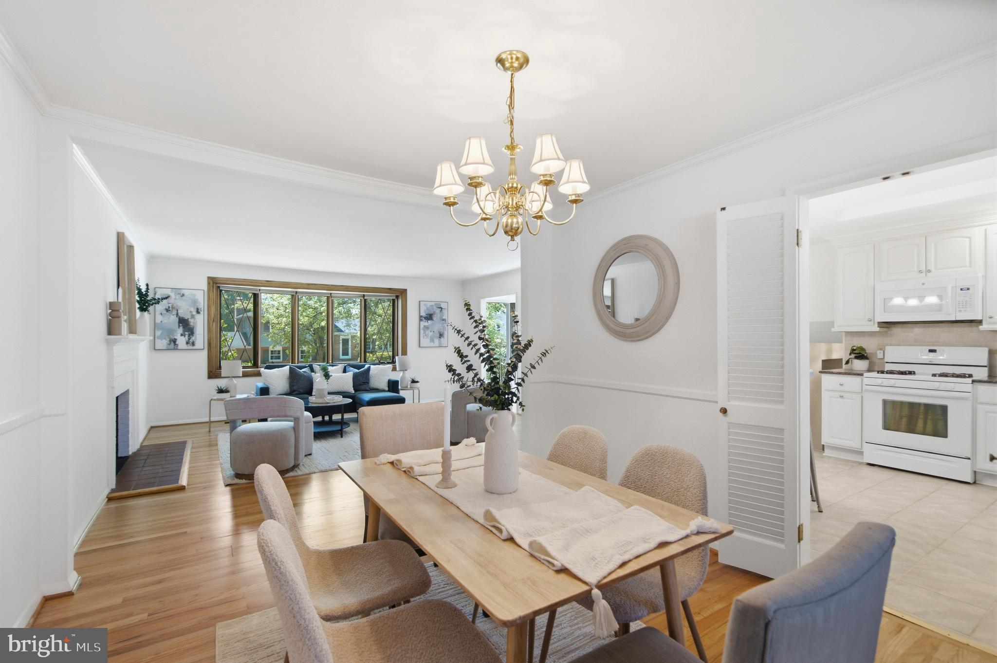 220 Solway Road Lutherville-Timonium, MD 21093 - Photo 6 of 38 a view of a dining room with furniture a chandelier and wooden floor