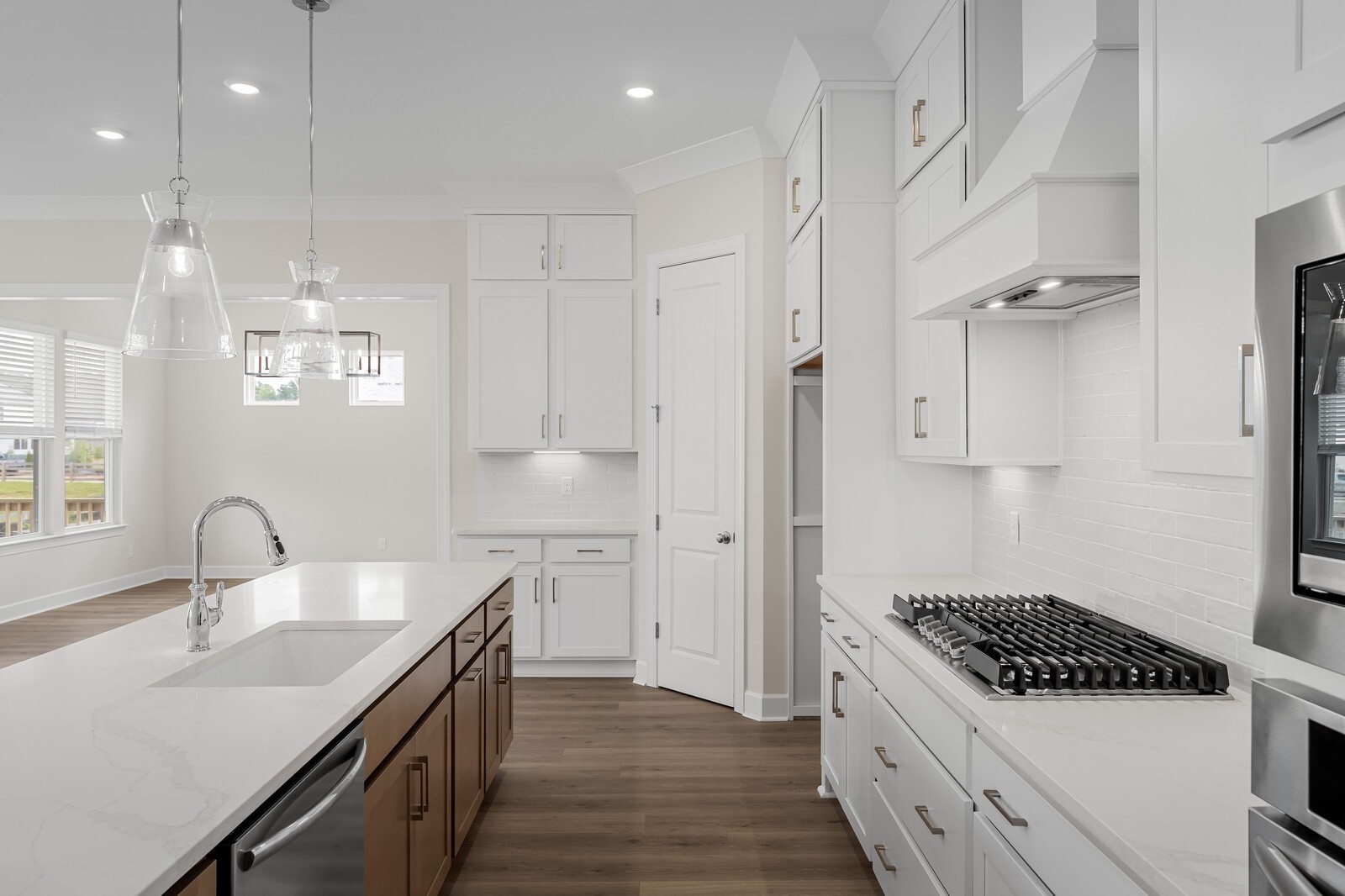 7456 Atwater Circle Fairview, TN 37062 - Photo 18 of 49 a kitchen with white cabinets and appliances