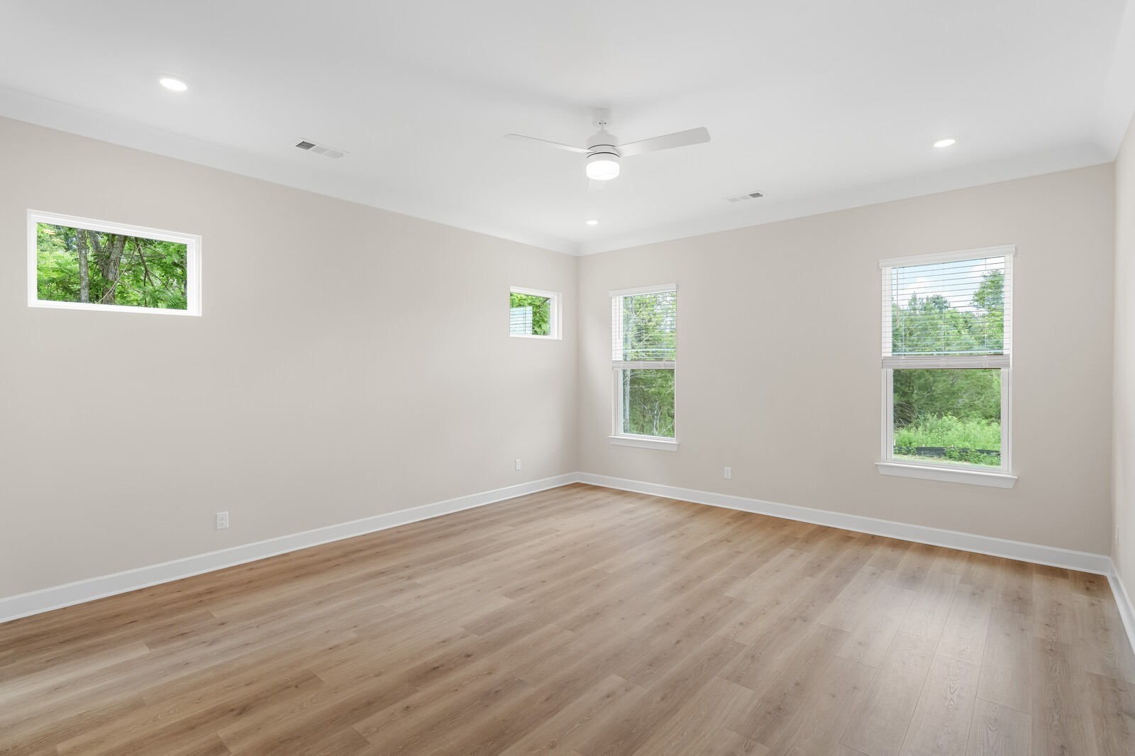 7456 Atwater Circle Fairview, TN 37062 - Photo 24 of 49 an empty room with wooden floor and windows