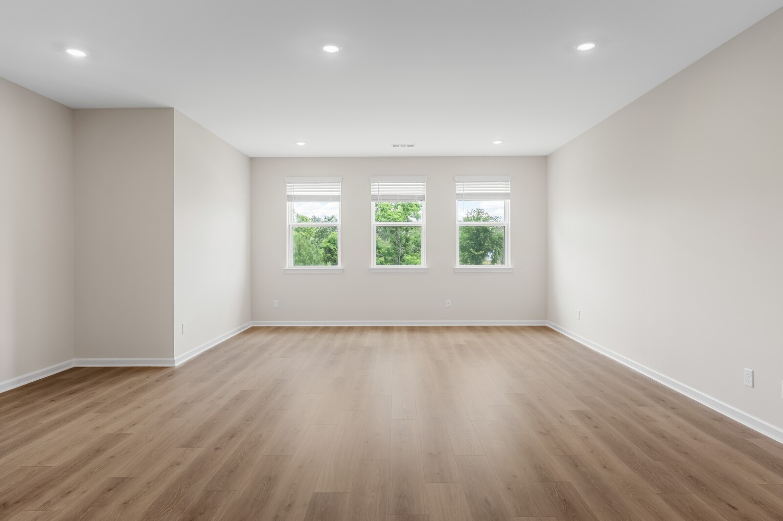 7456 Atwater Circle Fairview, TN 37062 - Photo 34 of 49 an empty room with wooden floor and windows