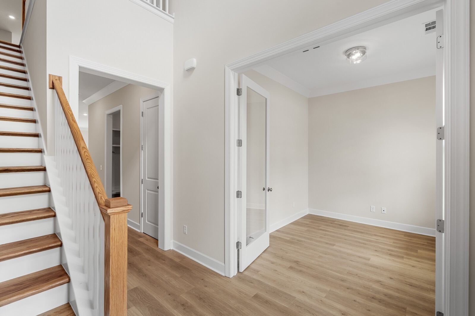 7456 Atwater Circle Fairview, TN 37062 - Photo 4 of 49 a view of a hallway with wooden floor and entryway