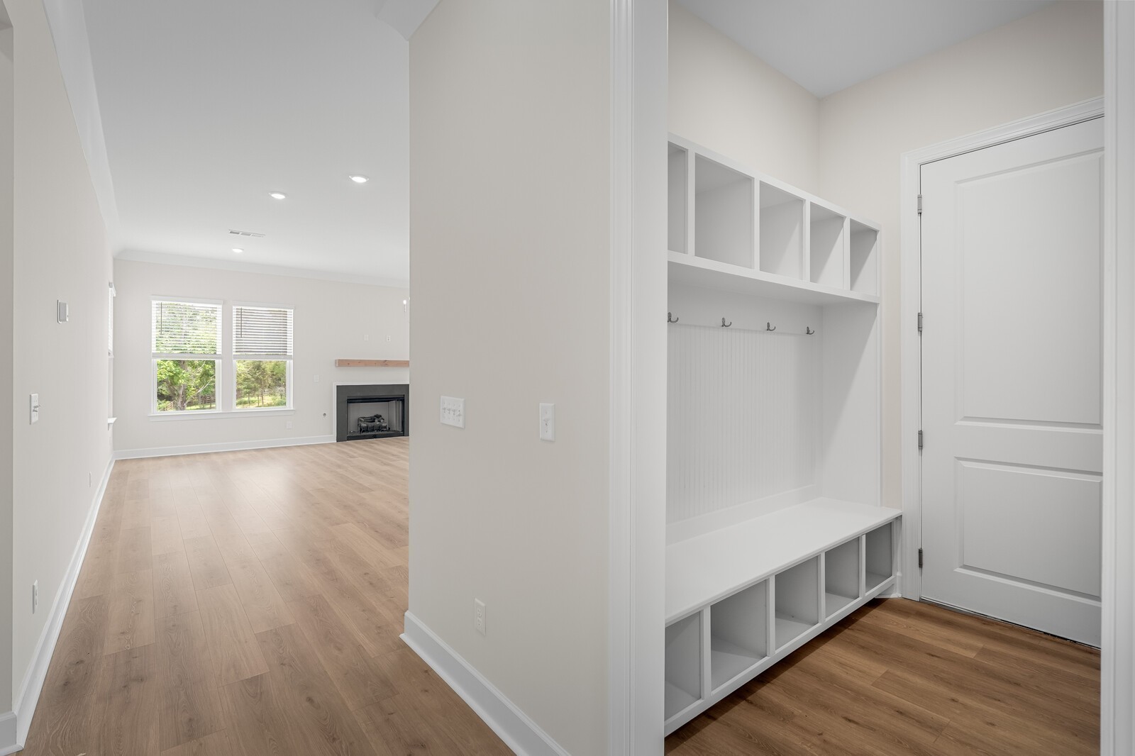 7456 Atwater Circle Fairview, TN 37062 - Photo 10 of 49 a view of an empty room with wooden floor and a window