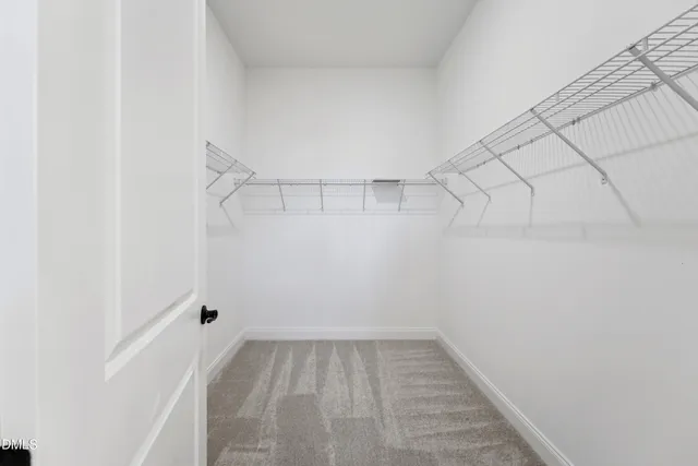 a view of a room with racks on the wall