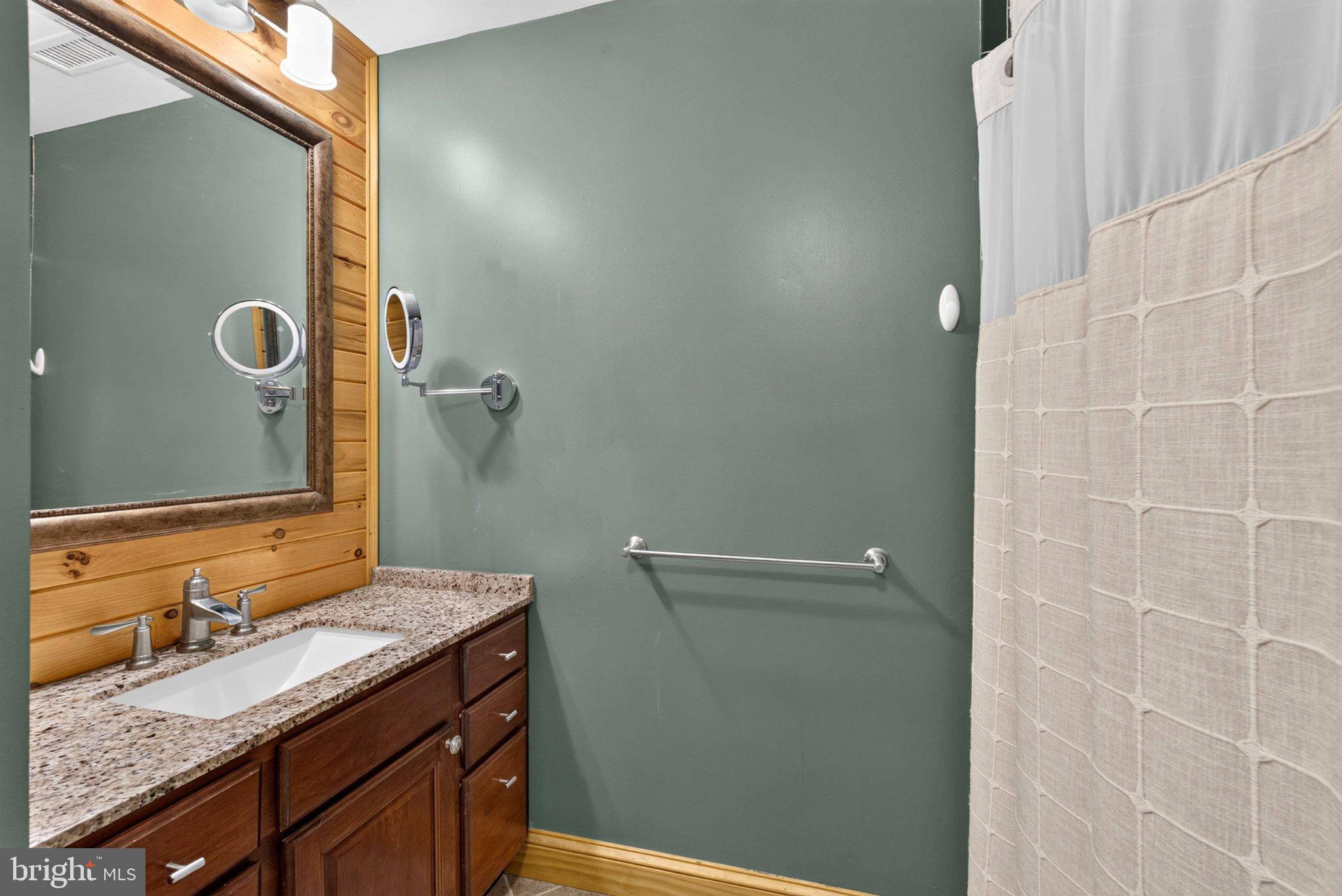 2858 Lodge Farm Road Baltimore, MD 21219 - Photo 18 of 49 Chic bathroom with rustic charm.
