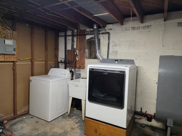 a utility room with dryer and washer