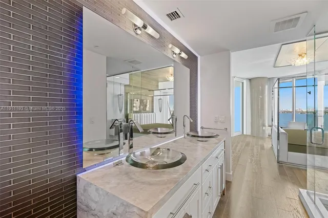 a bathroom with a sink and toilet