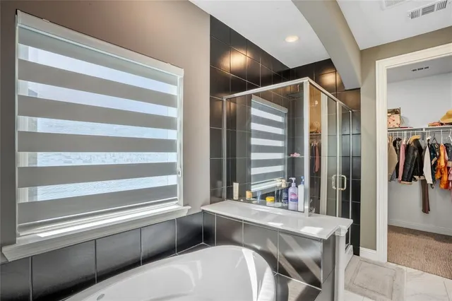 a dinning room with a table and chairs