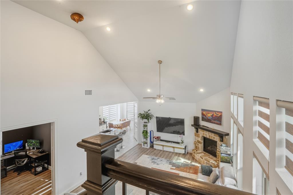 4424 English Maple Drive Arlington, TX 76005 - Photo 25 of 40 a living room with furniture and a flat screen tv