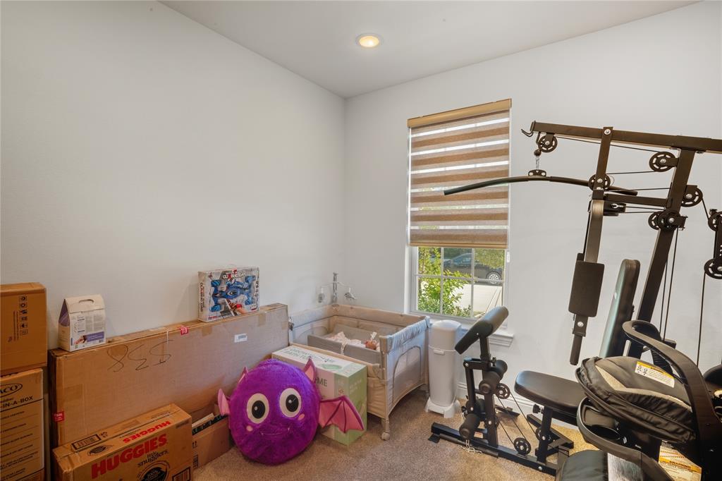 4424 English Maple Drive Arlington, TX 76005 - Photo 28 of 40 a bed room with a bed and a window