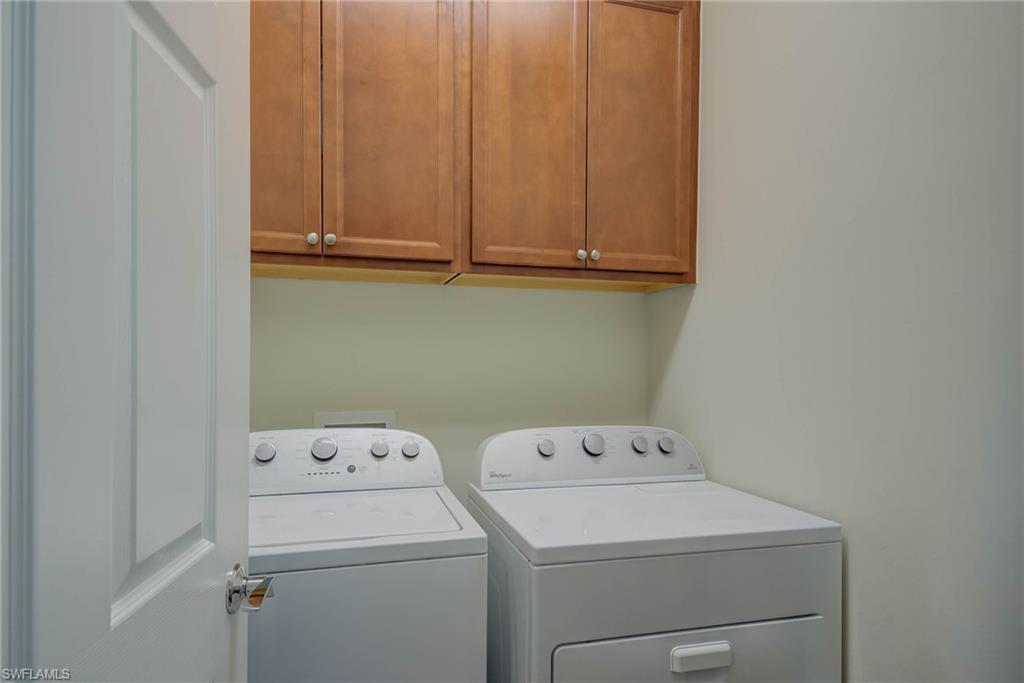 5211 Ciatto Way Ave Maria, FL 34142 - Photo 20 of 31 a utility room with dryer and washer