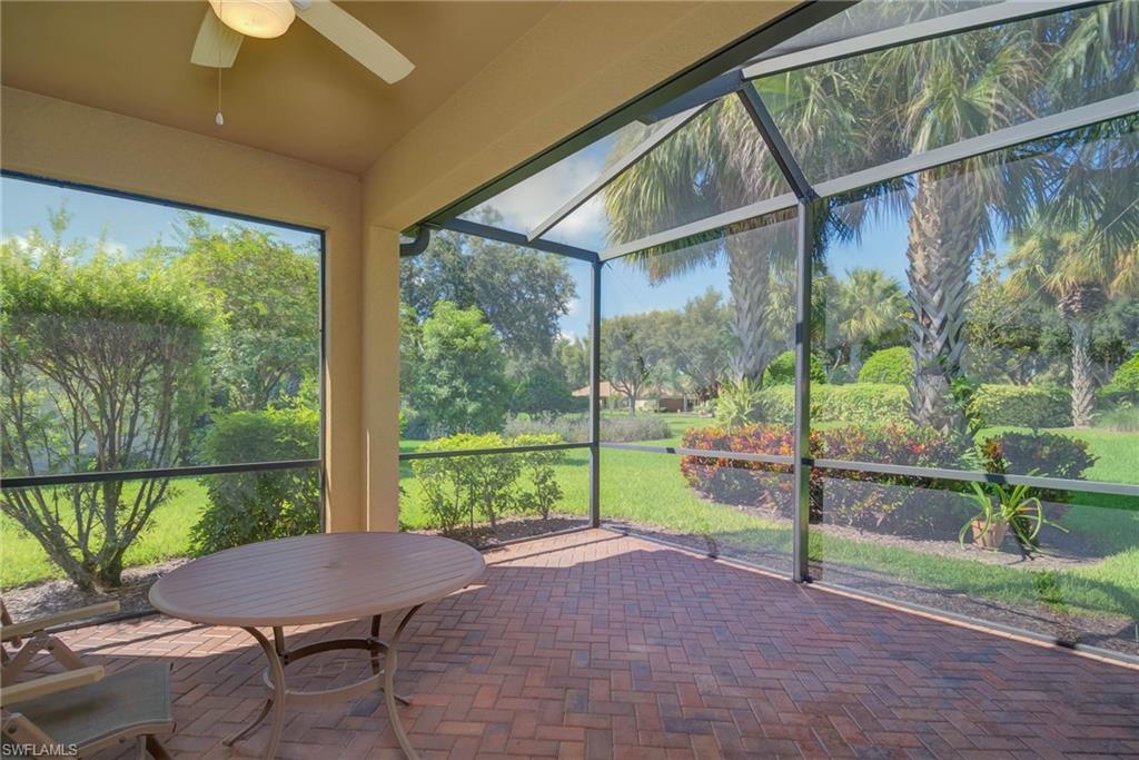 5211 Ciatto Way Ave Maria, FL 34142 - Photo 22 of 31 a view of a porch with furniture and backyard