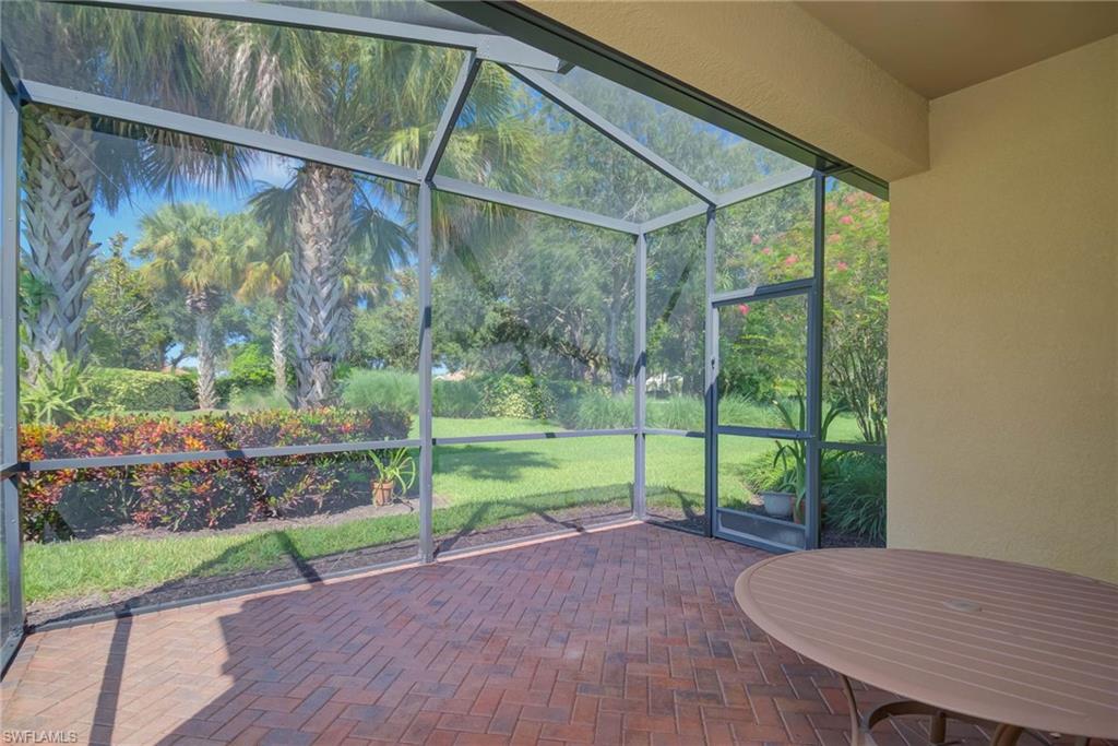 5211 Ciatto Way Ave Maria, FL 34142 - Photo 23 of 31 a view of a porch with a backyard