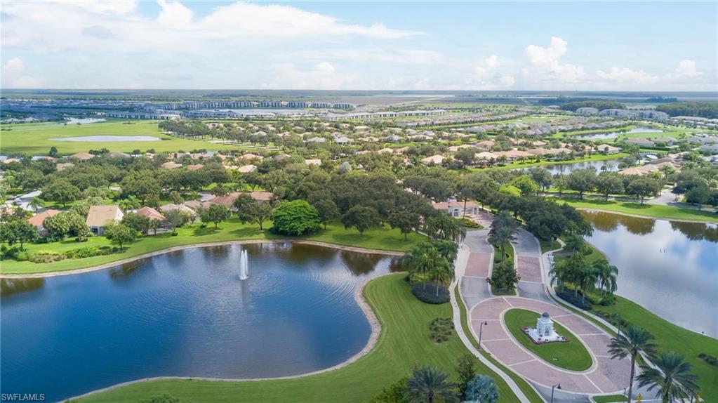 5211 Ciatto Way Ave Maria, FL 34142 - Photo 29 of 31 an aerial view of residential houses with outdoor space and lake view