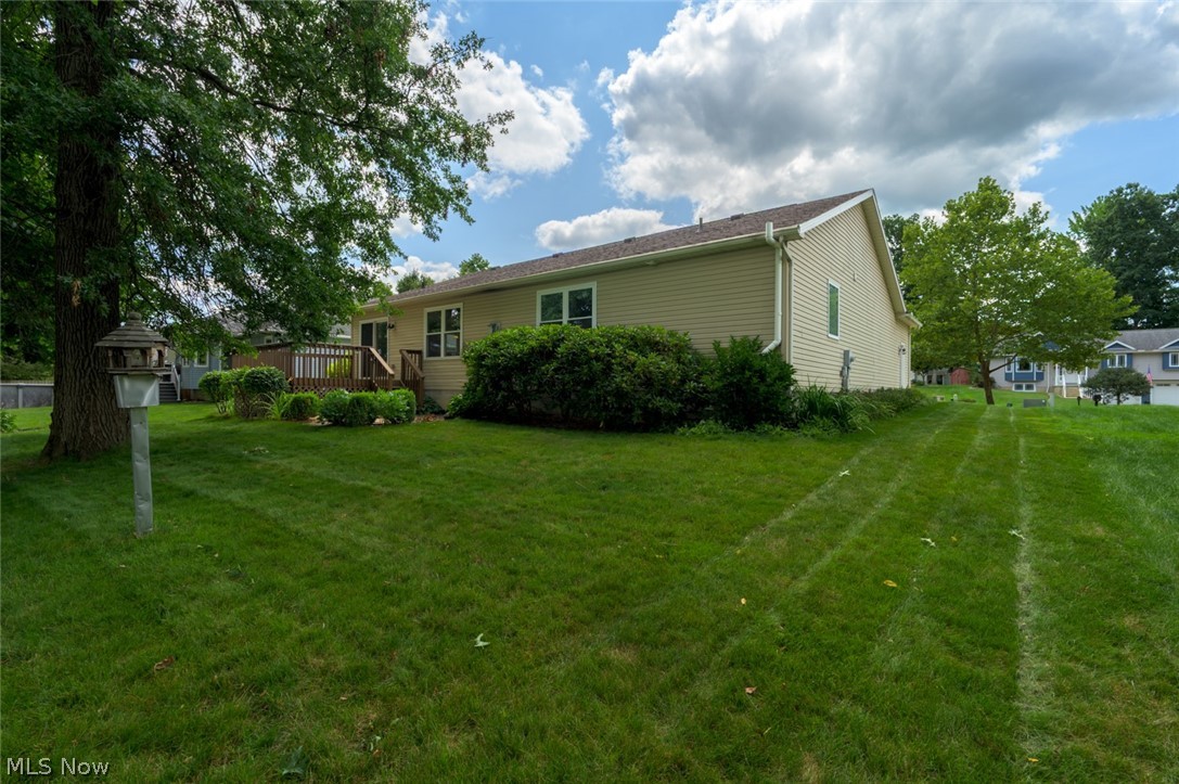 1048 Susan Road Ravenna, OH 44266 - Photo 6 of 35 Expansive green lawn with mature trees