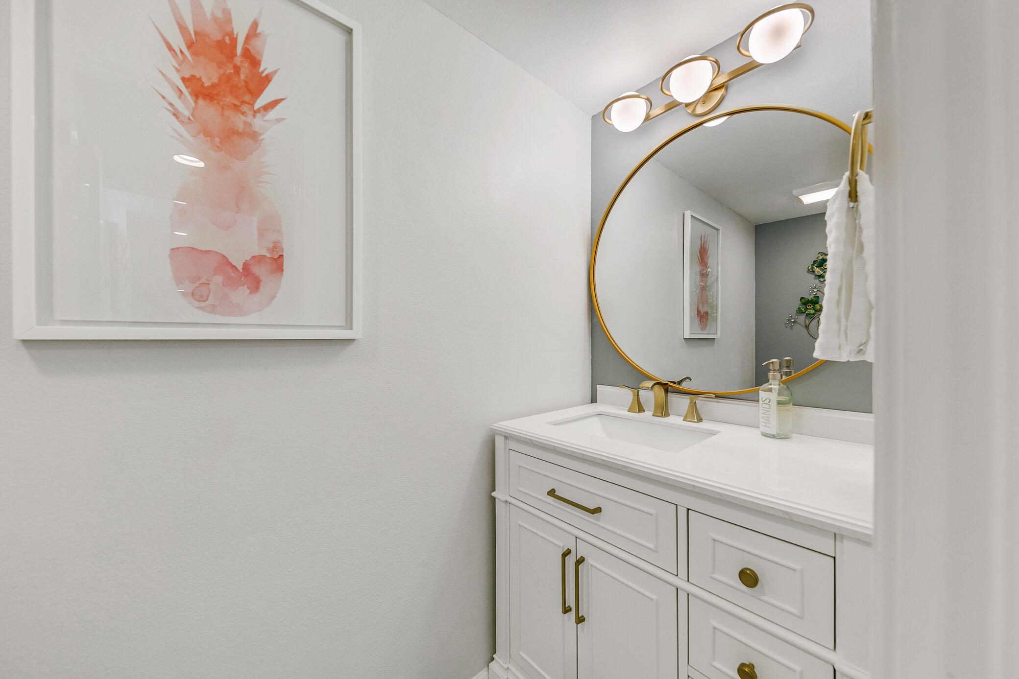 6025 Arroyo Road, Unit 7 Palm Springs, CA 92264 - Photo 12 of 43 a bathroom with a sink and a mirror