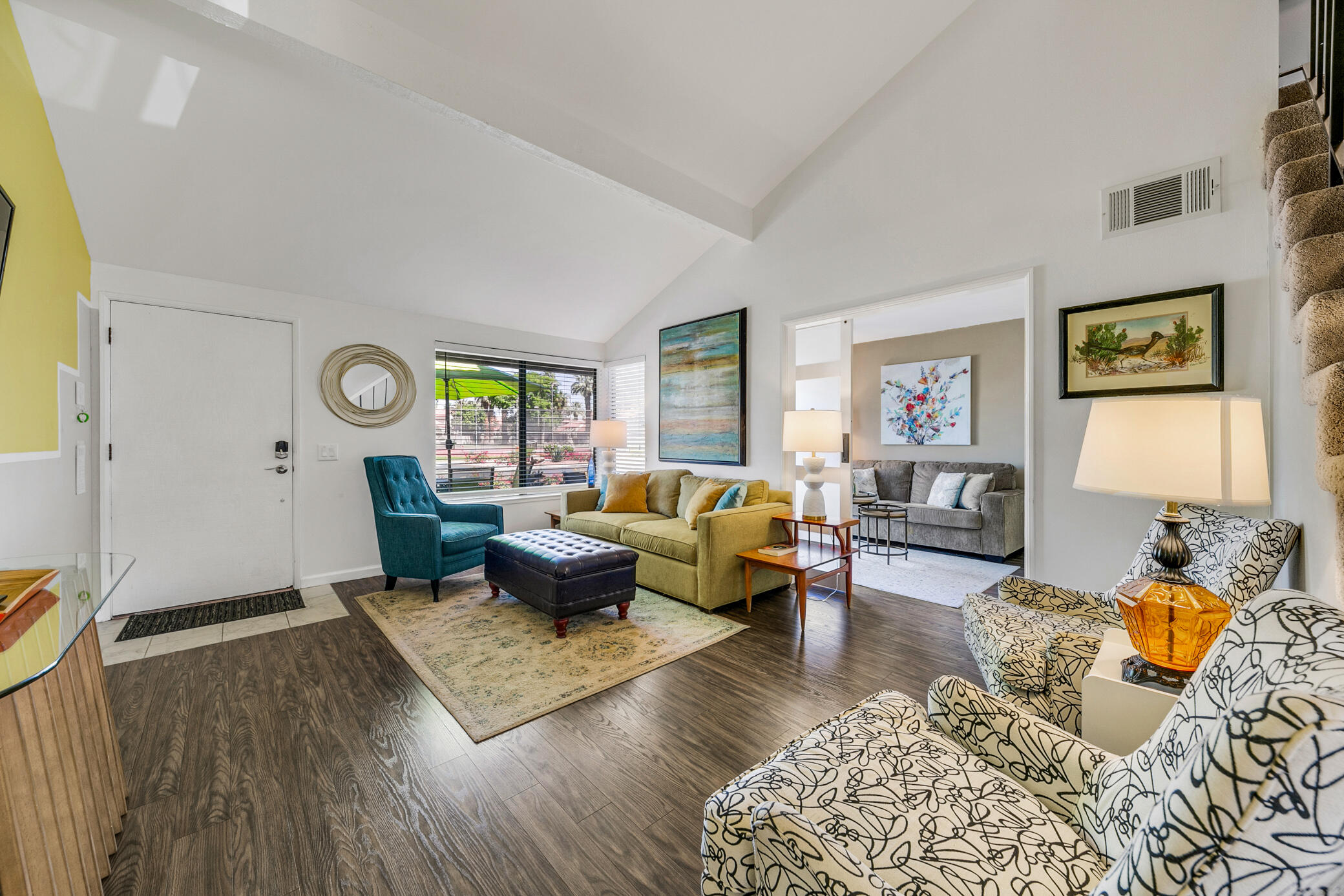 6025 Arroyo Road, Unit 7 Palm Springs, CA 92264 - Photo 5 of 43 a living room with furniture rug and window